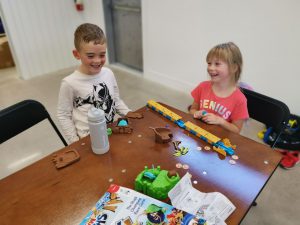 Kids playing with board games